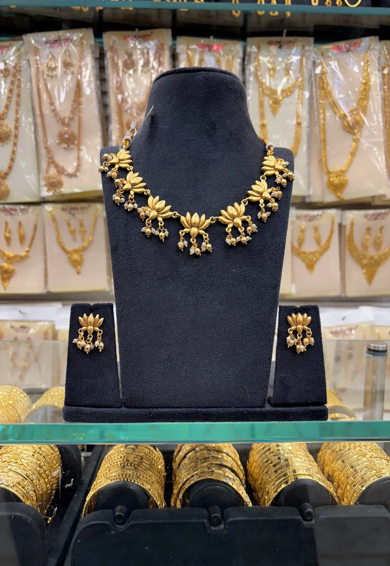 Gold Beats Lotus Necklace