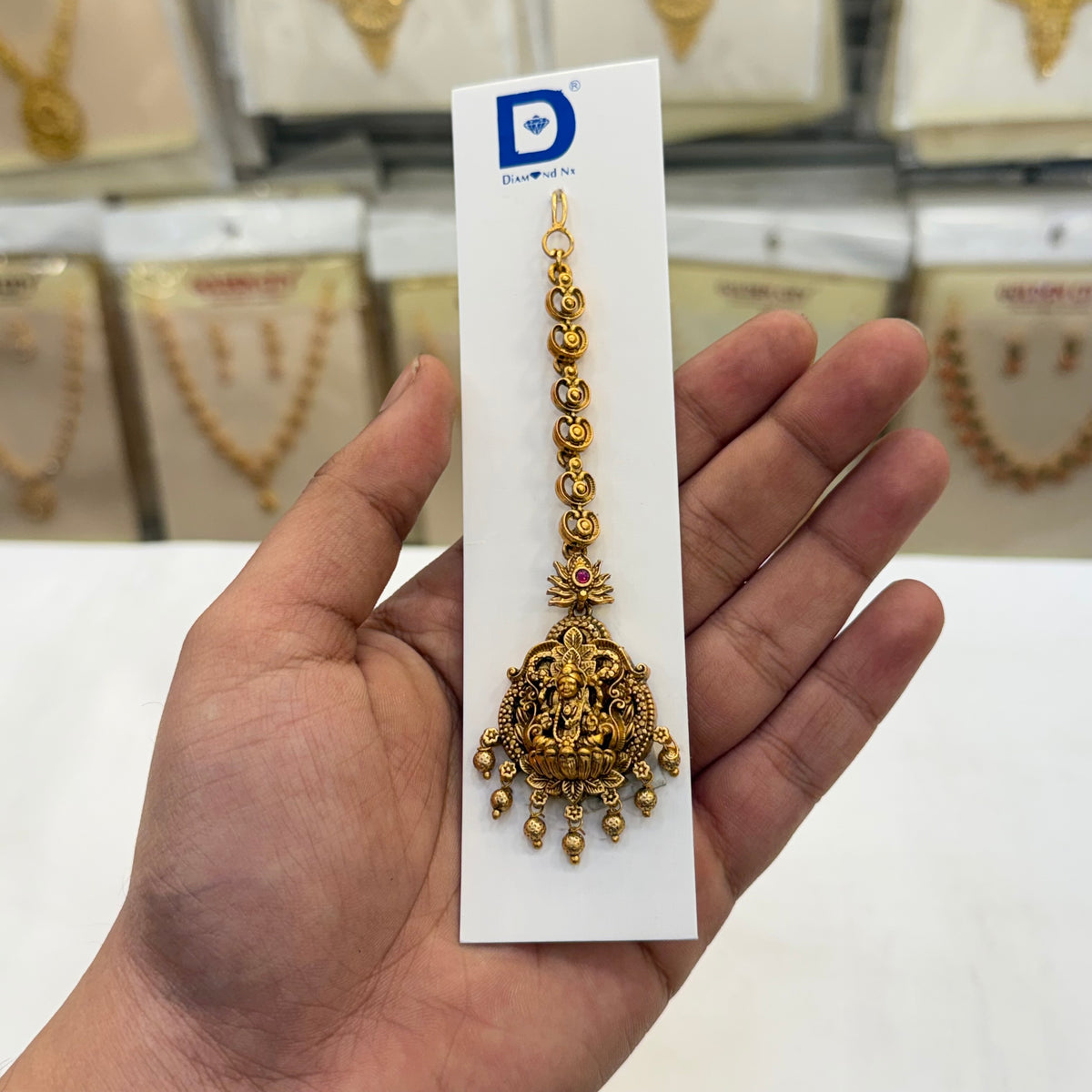 Swarna Lakshmi Tikka - Gold Beats